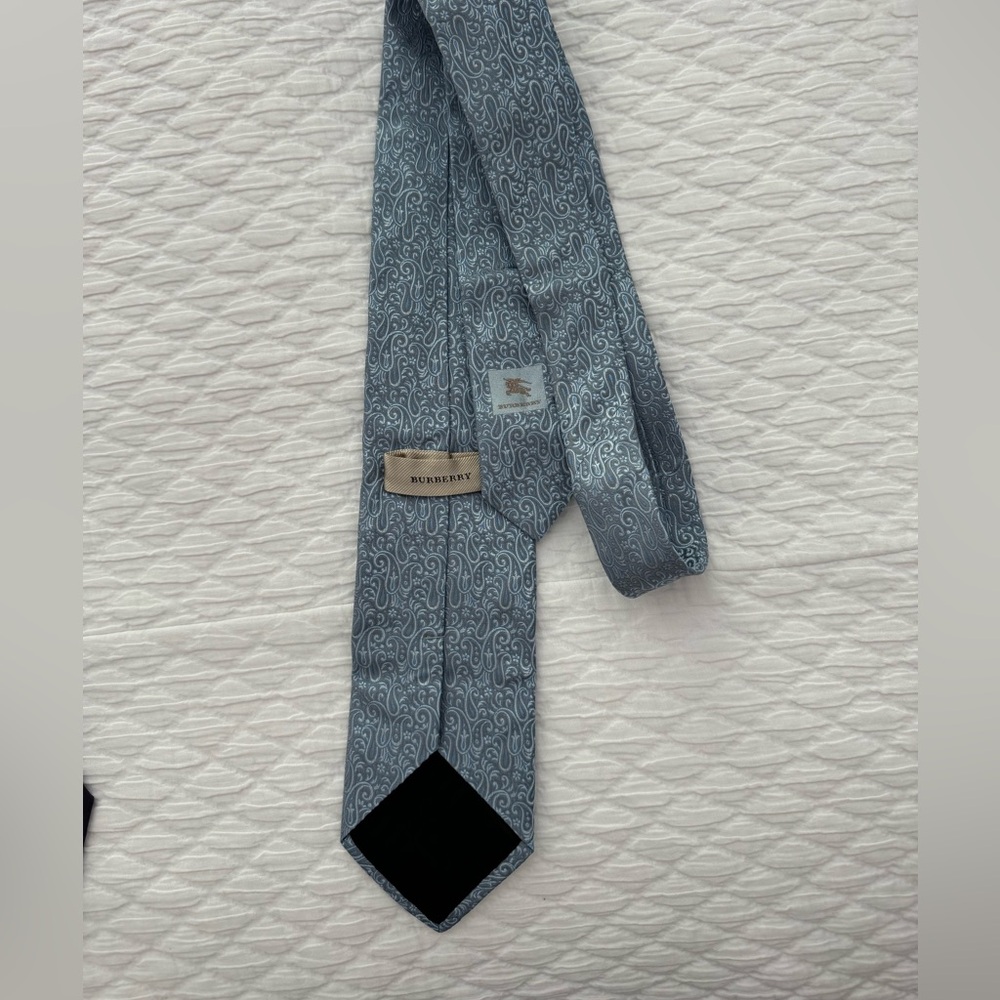 Burberry tie, worn 4/5 times.  Great condition.